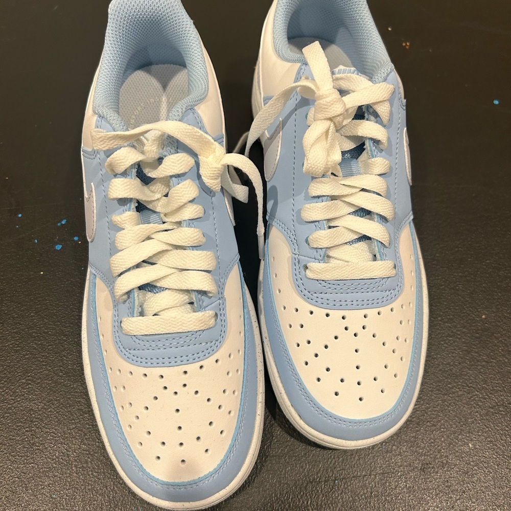 Woman’s NIKe Blue and White Sneakers